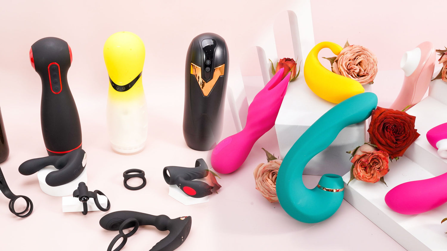 A variety of sex toys, like dick rings, vibrators, dildos and Fleshlights, are placed on the table